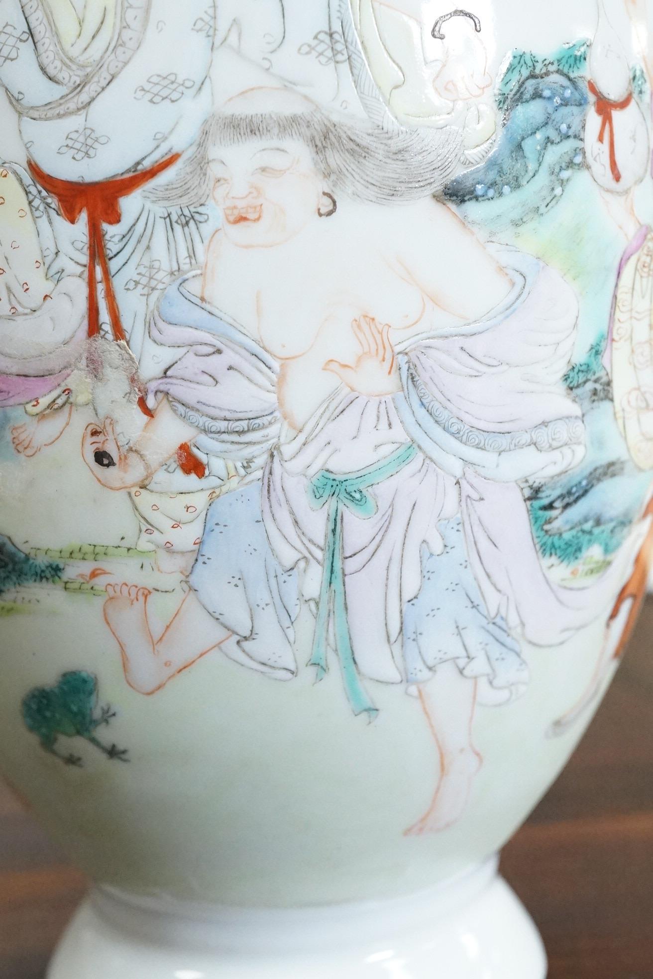 A Chinese famille rose ‘Liu Hai’ bottle vase, Qianlong six character seal mark but Republic period
